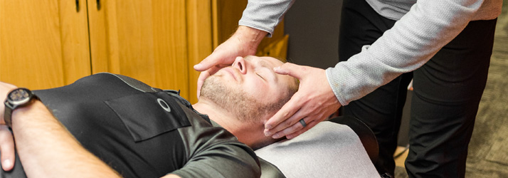 Chiropractor Algona IA Shane Taffe Adjusting A Patient
