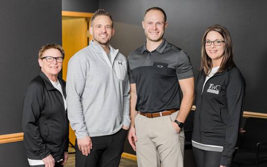 Chiropractor Algona IA Shane Taffe With Staff